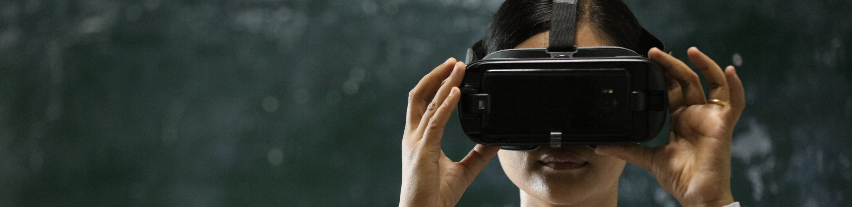 Young woman with VR glasses.