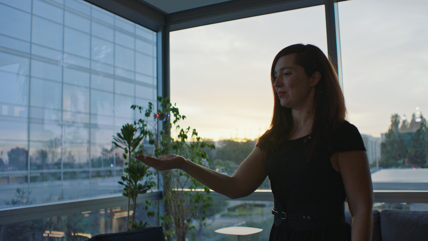 Woman holding a drone