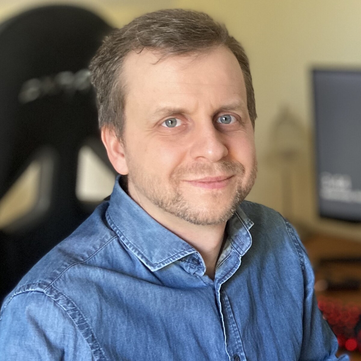 man sitting in office chair