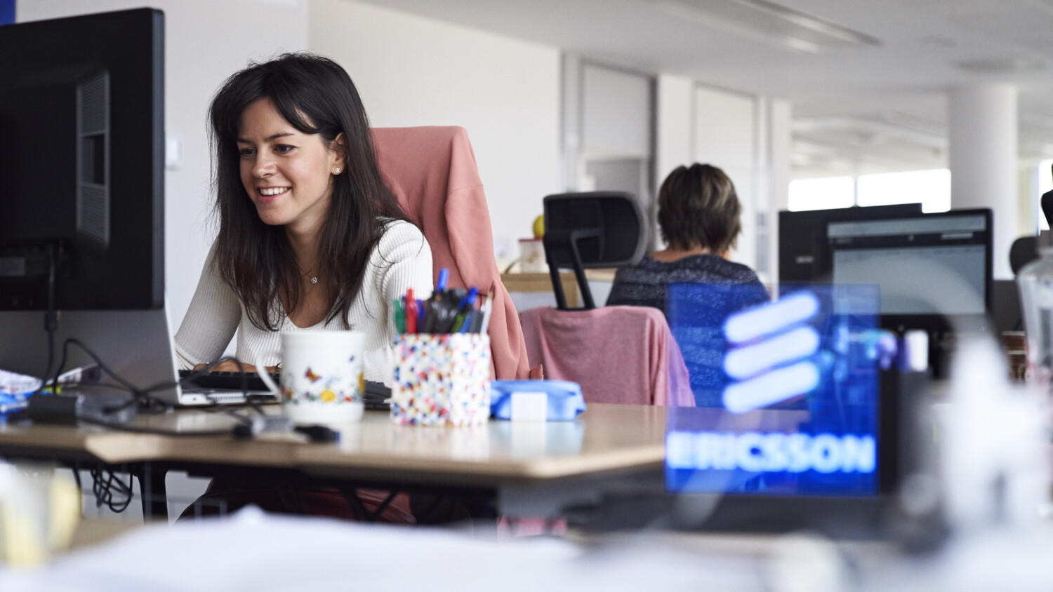 Person at her workstation.
