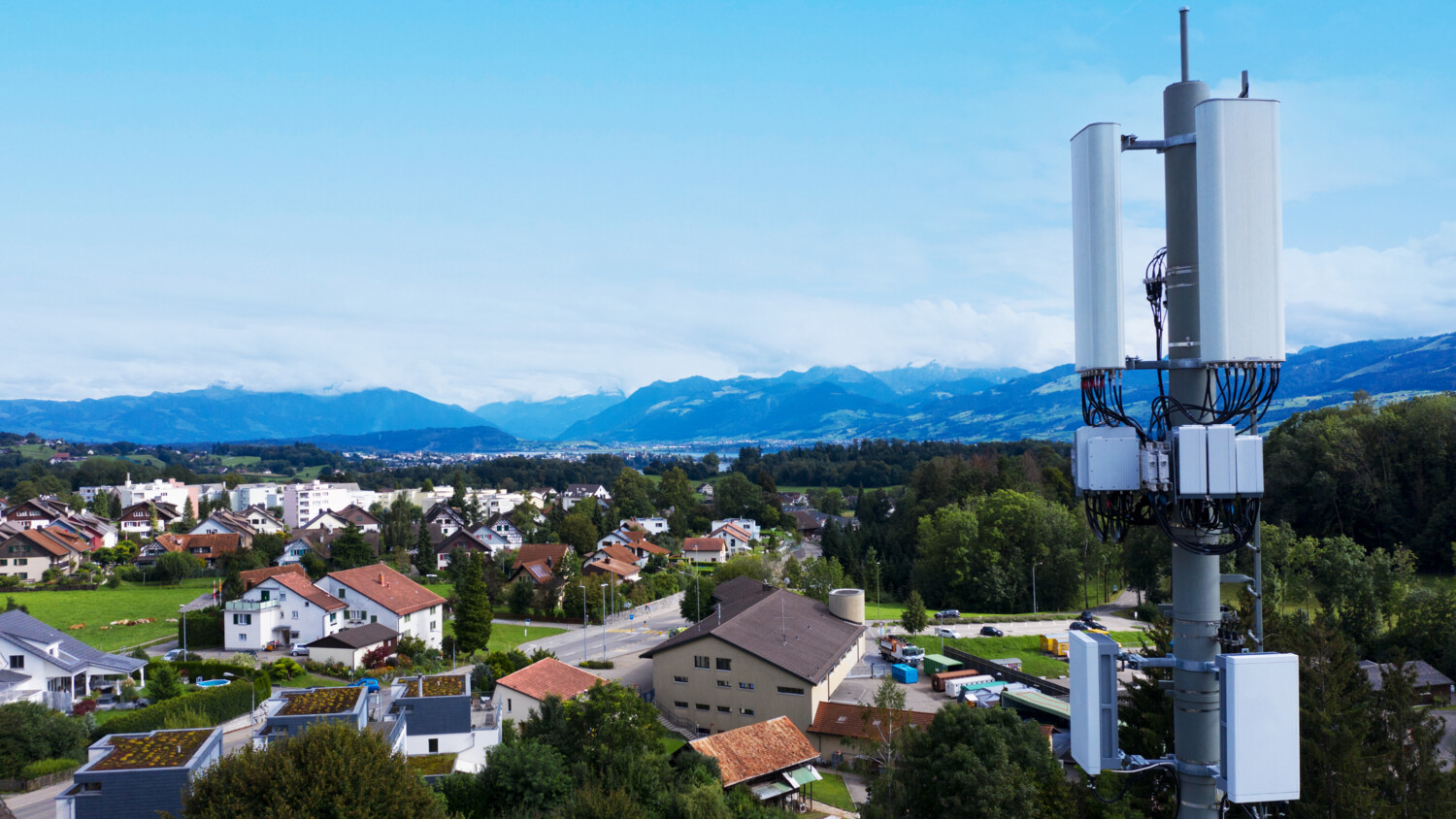 Aerial view of antennas and rural landscape