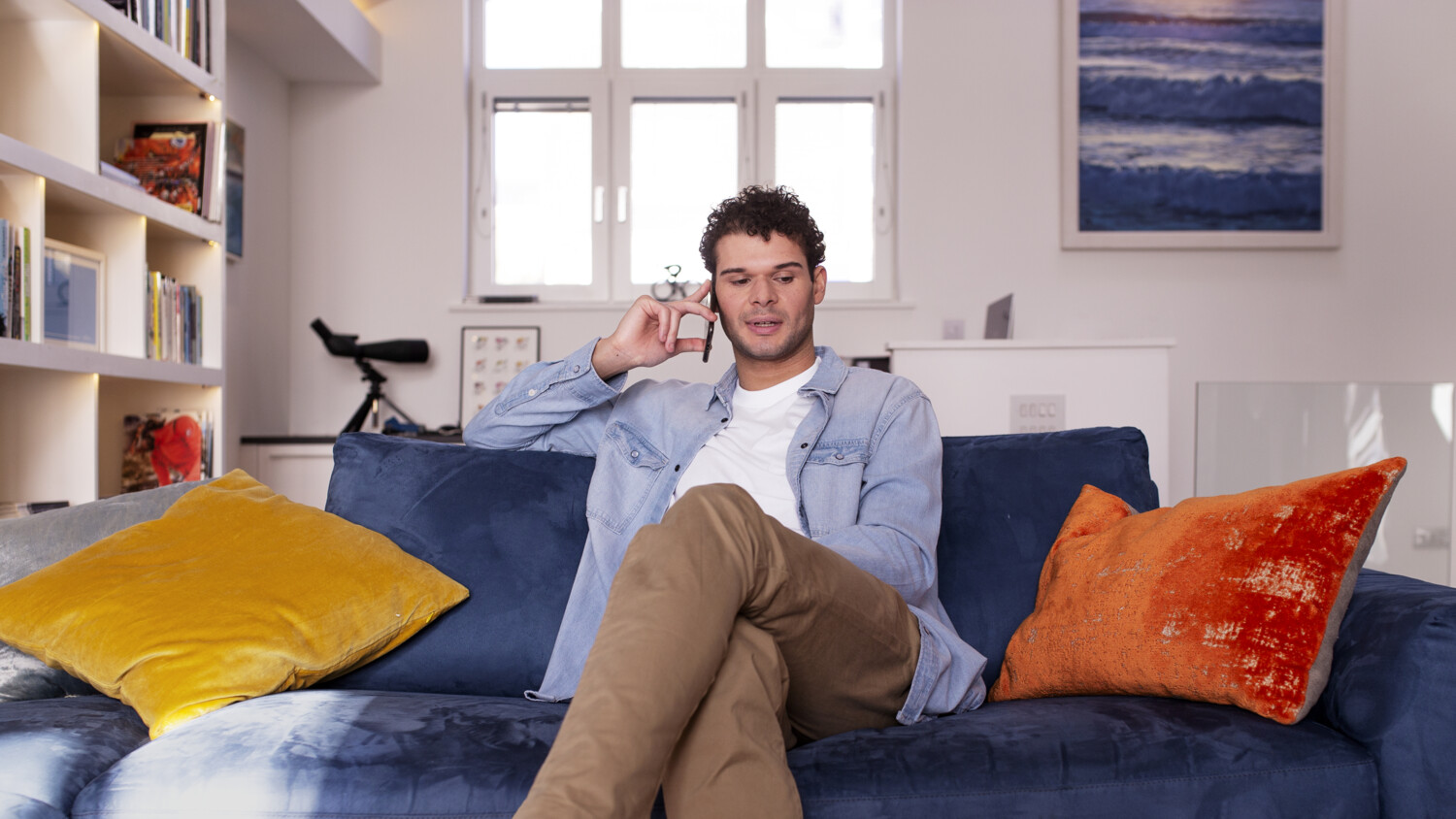 Man talking on the phone using 5G voice solutions