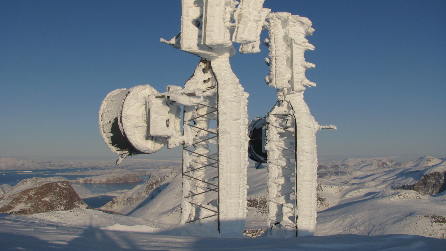 Radio masts in snowy area.
