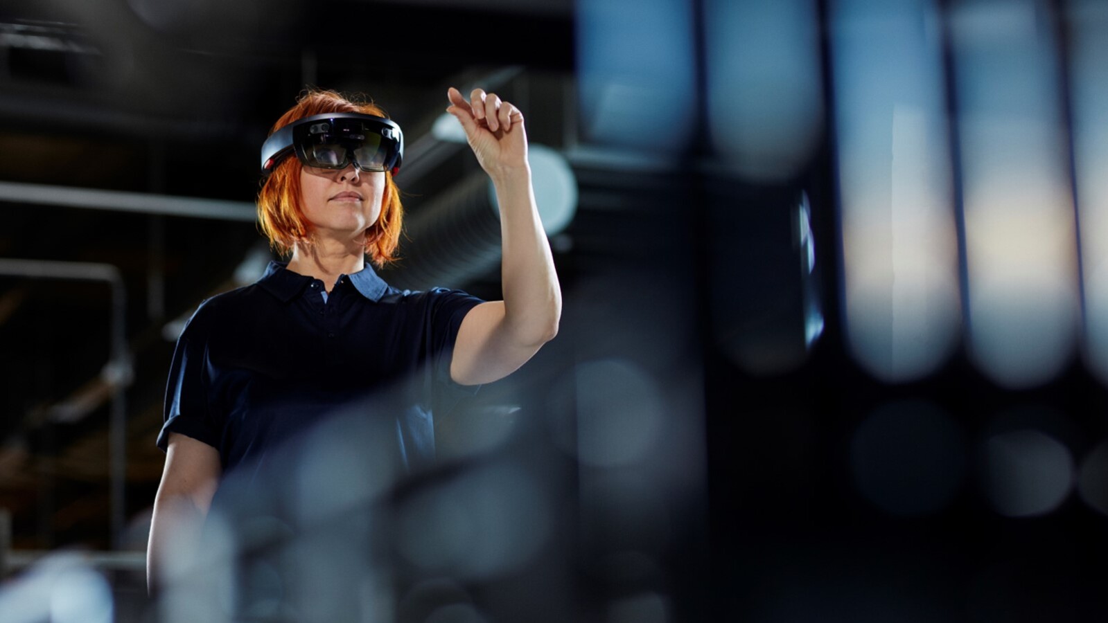 Woman wearing vr glasses in a factory.