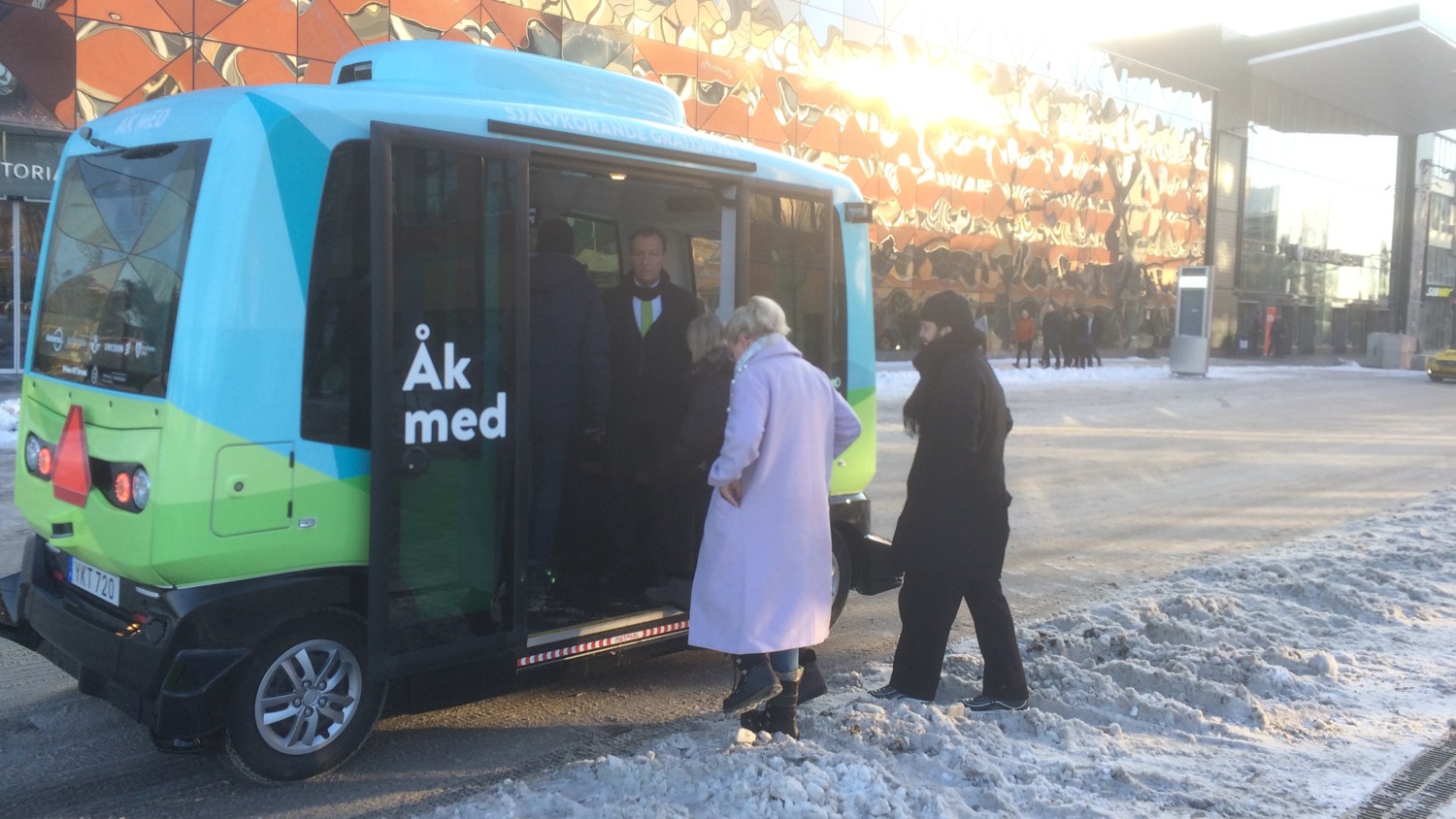 Image of the cute, green and blue, driverless, autonomous shuttle-bus in Kista, Stockholm.