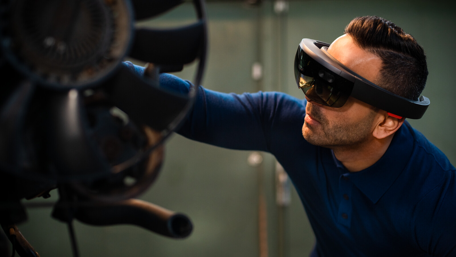 Person holding mobile phone.