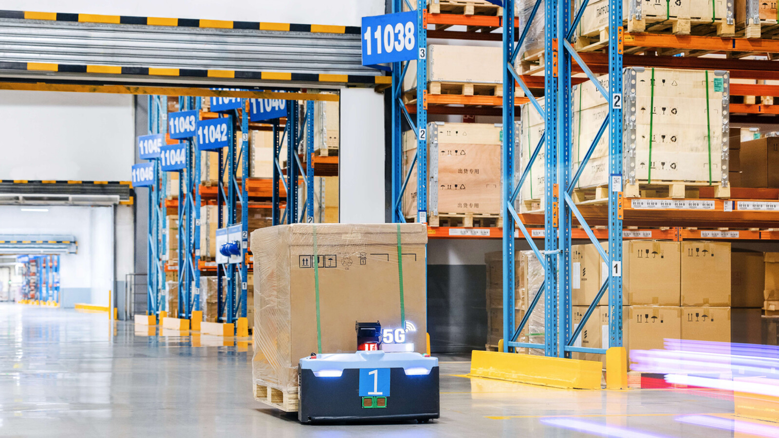 Robot picking up package.