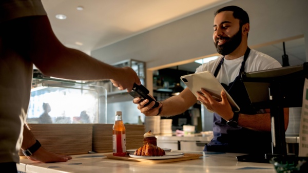 Man paying at a restaurant