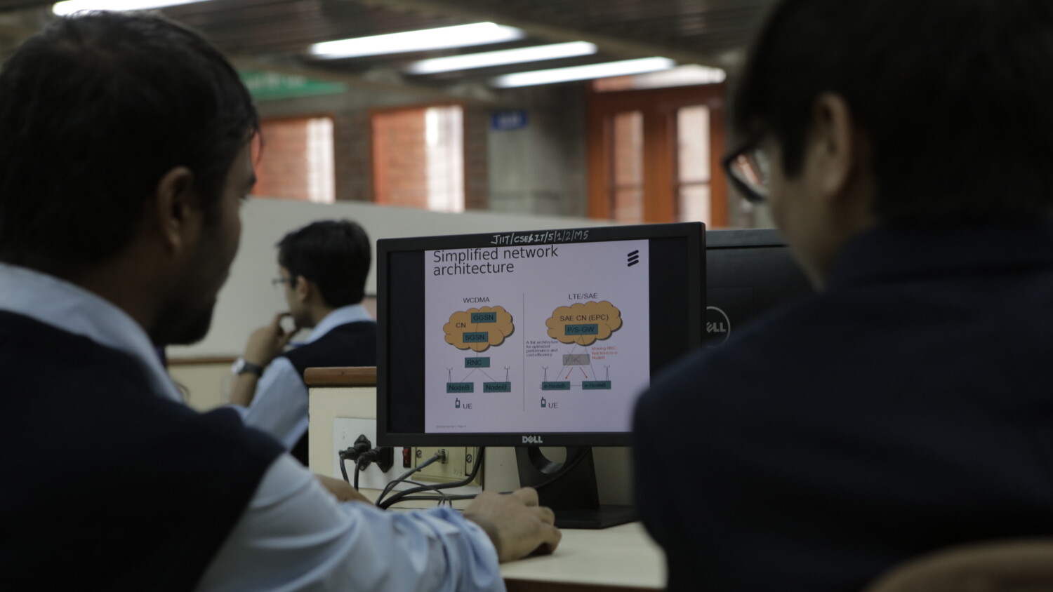 People looking at a computer-screen