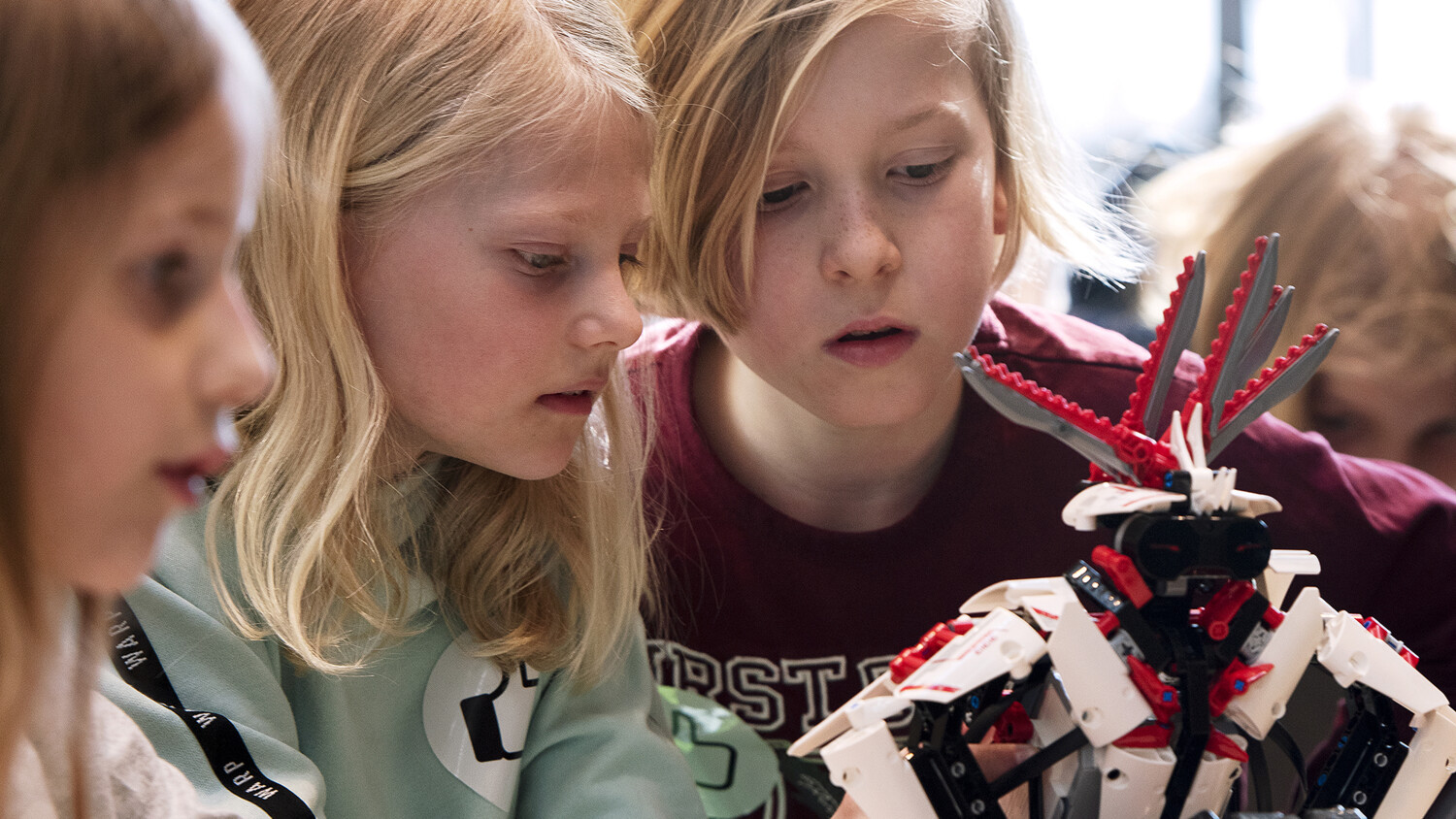 Kids with a Lego robot