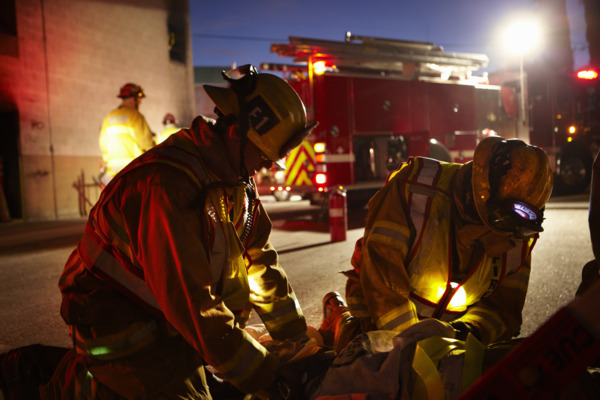 First responder fire service professionals conducting a drill.