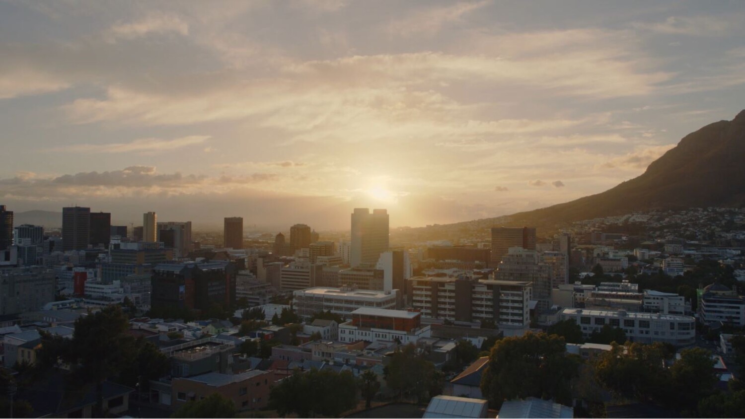 sunrise above a city
