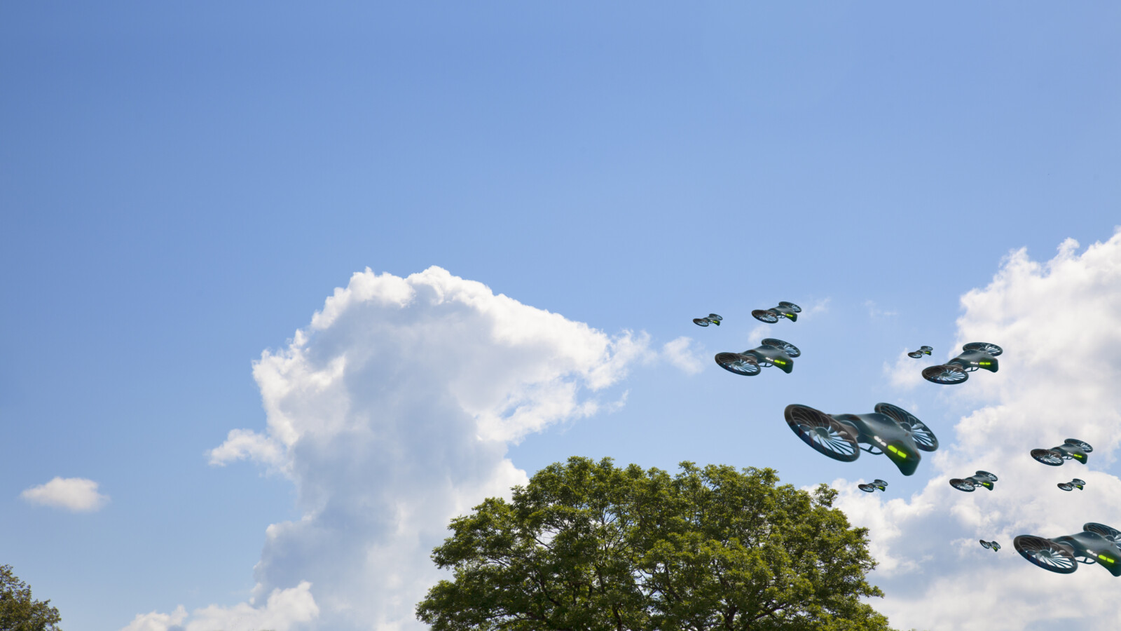 Futuristic drones flying in the sky.