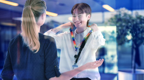 non-binary employee takes its entry card