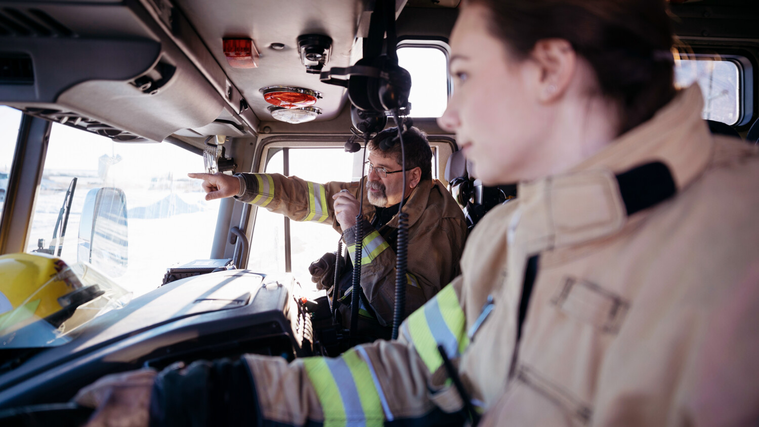 Mission critical firefighters driving fire engine