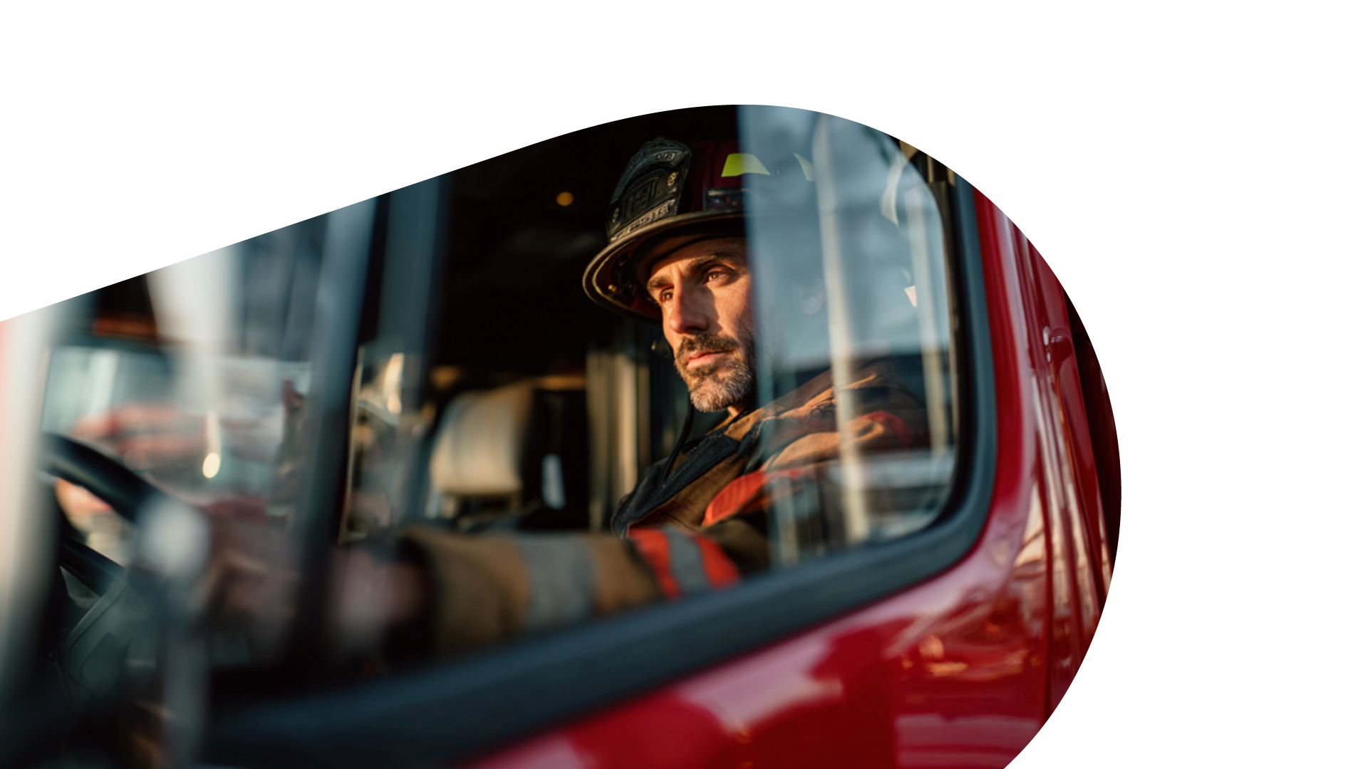 Firefighter in a fire truck.