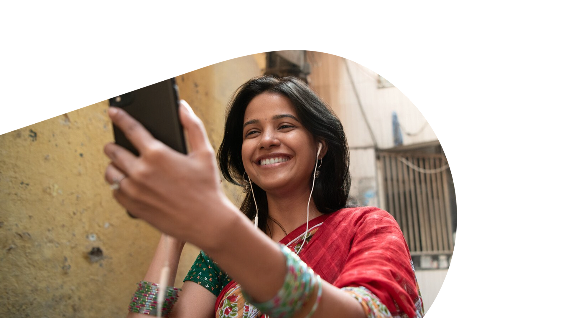 woman holding her phone