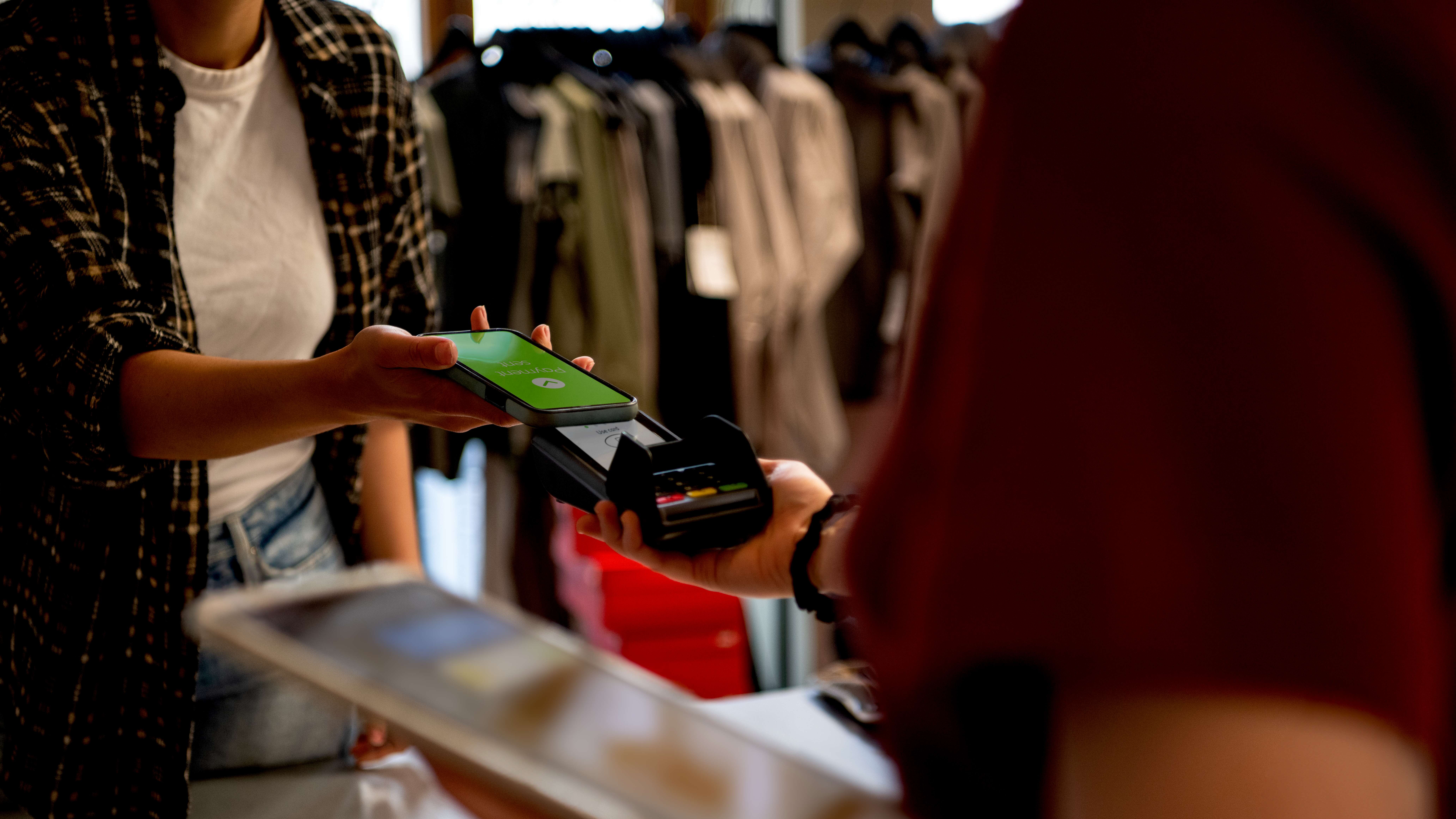 Shopper paying using the mobile phone