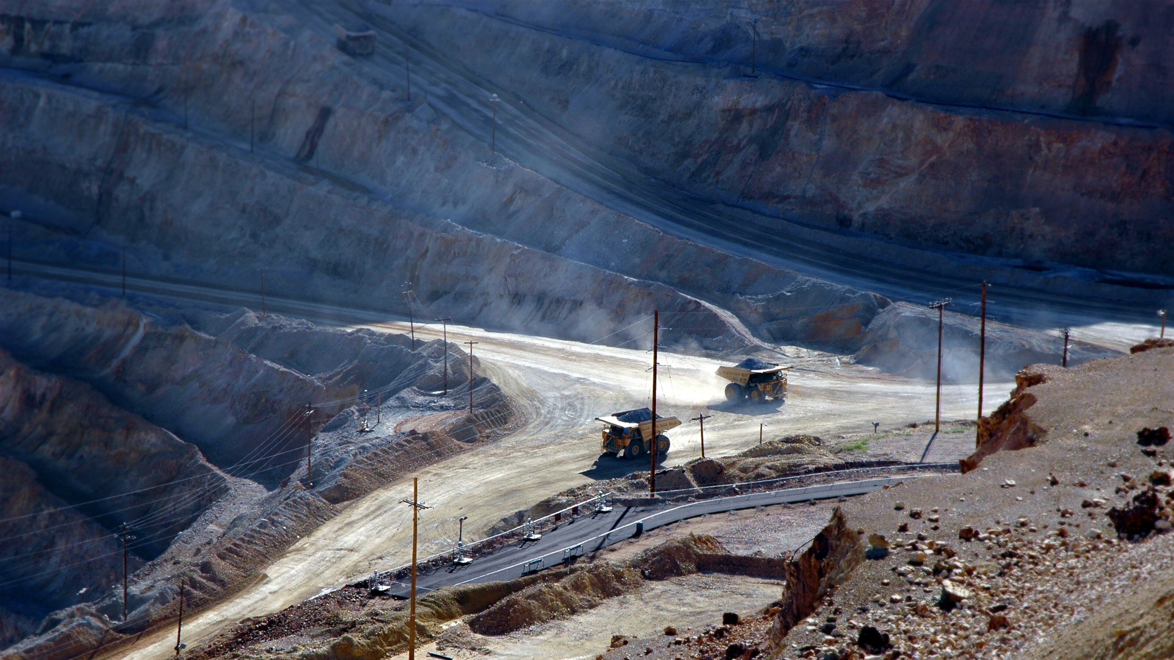 Dumpers in open pit copper mine.