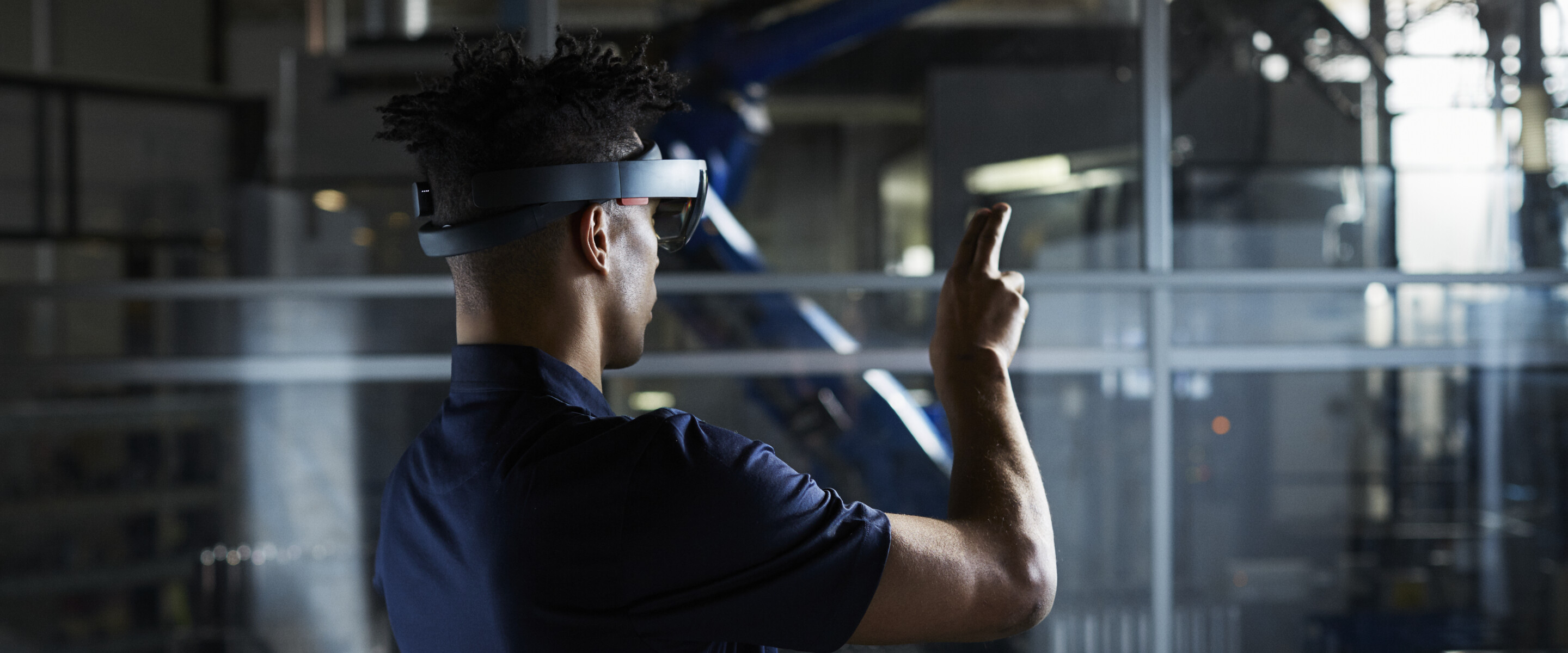 man in robot factory