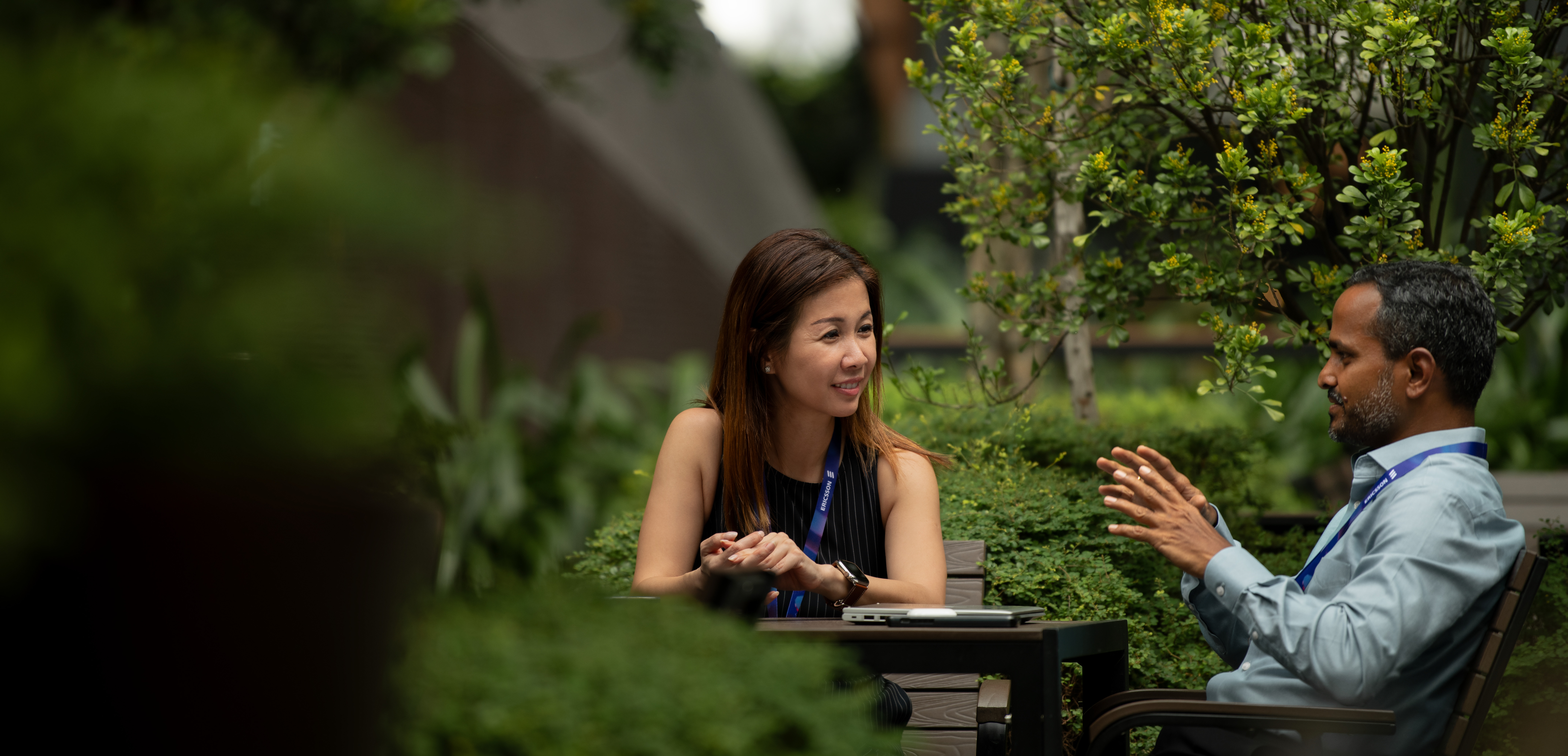 Man and woman talking outside