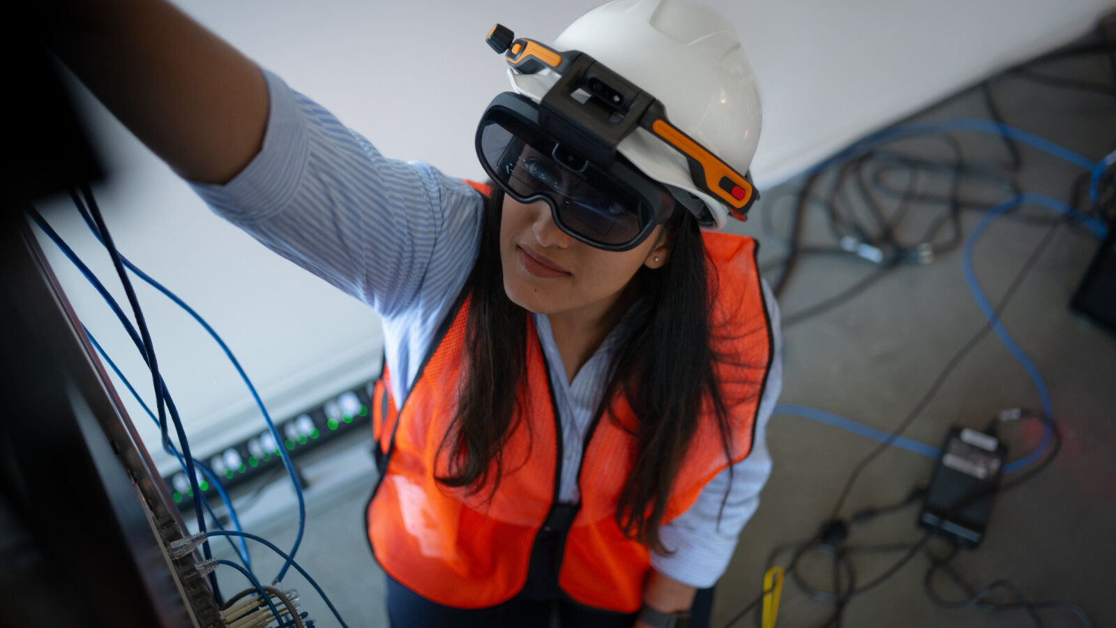 Woman working wearing VR glasses
