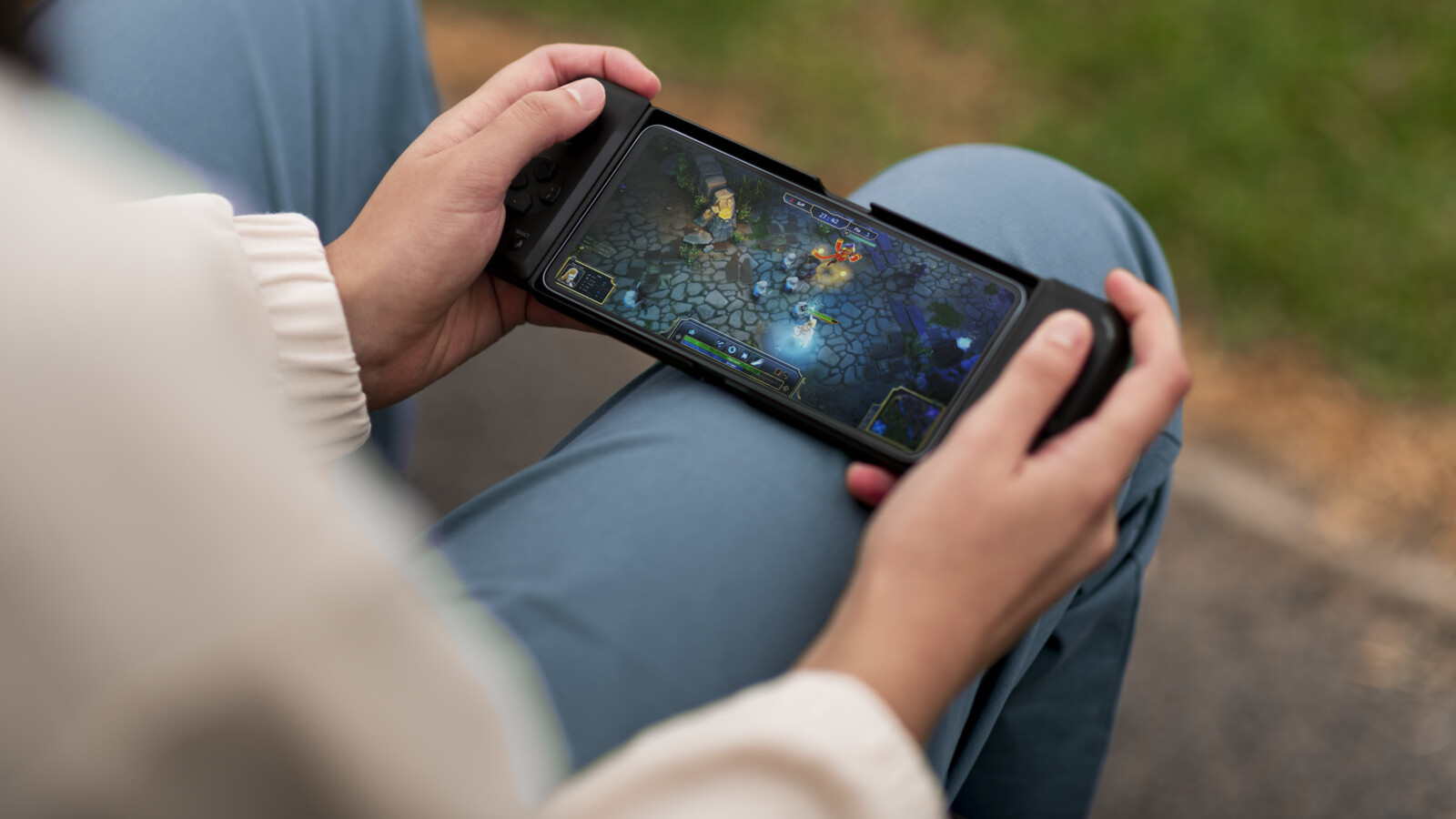 Person playing a game over 5G on his phone.