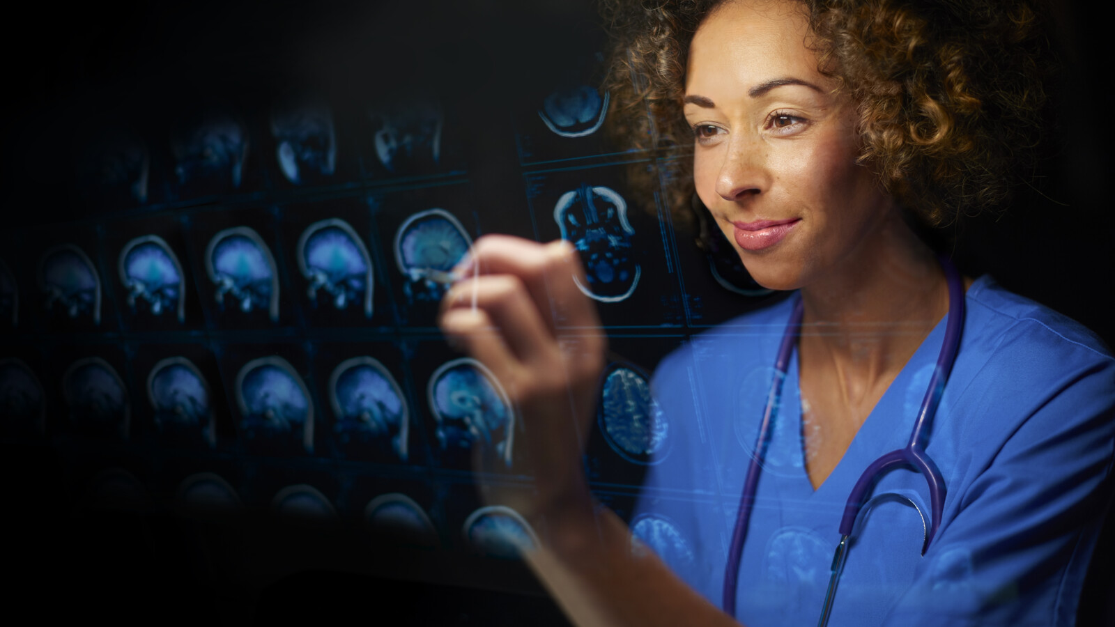 Female engineer working on rooftop site