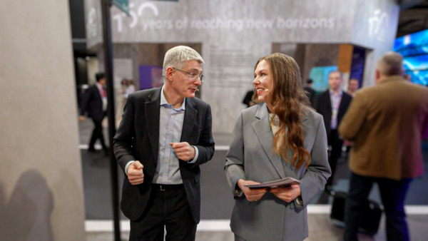 Erik and Karin talking to each other in Ericsson pavilion at MWC 2026