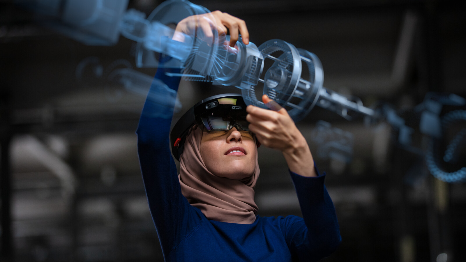 Woman working using 5G digital twin technology.