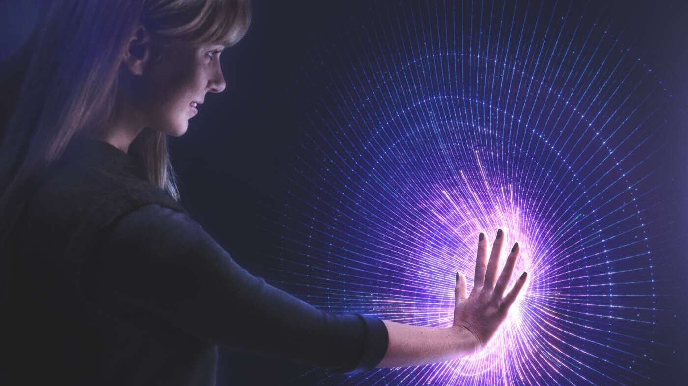 Woman interacting with immersive experience