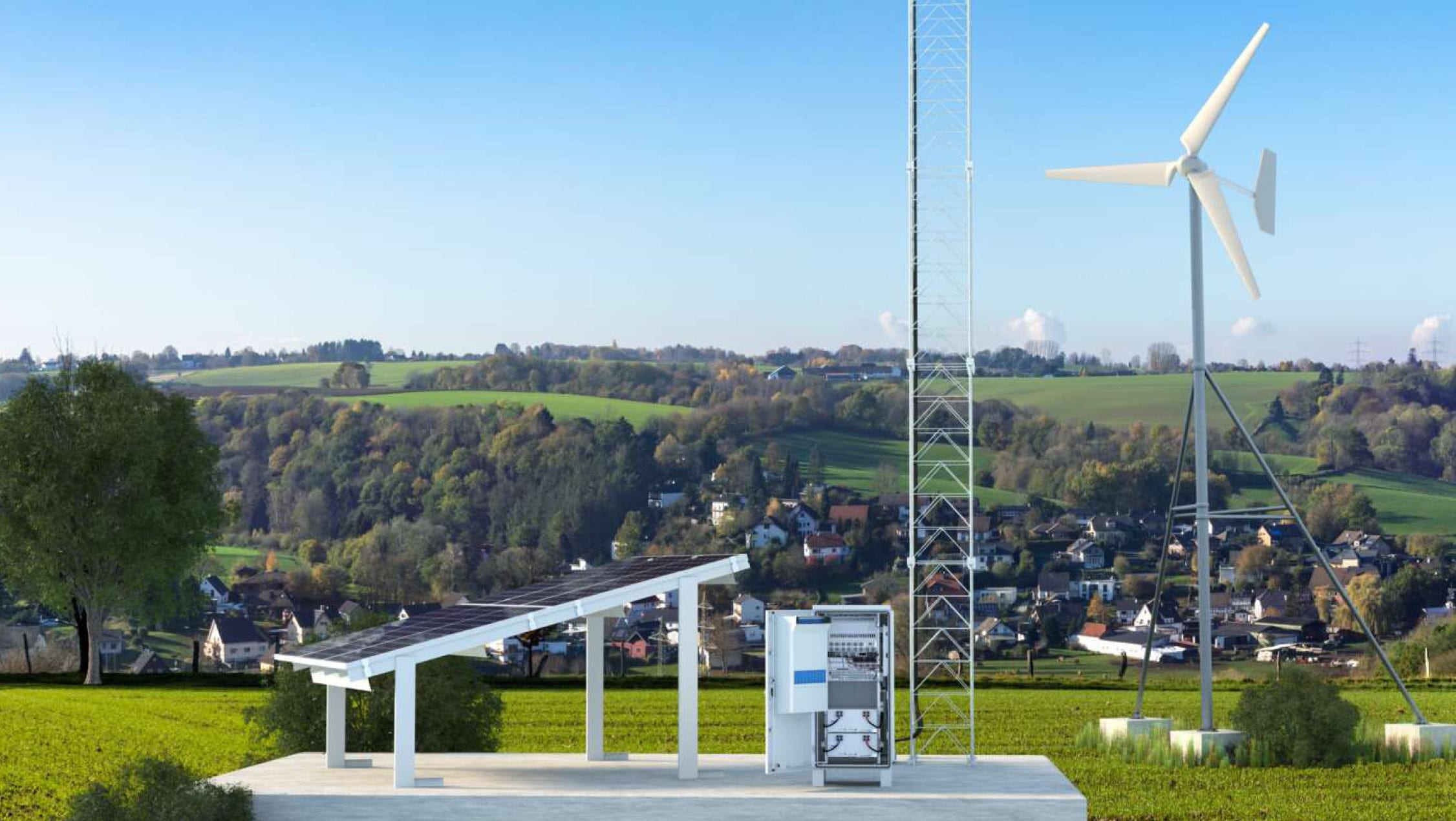 Solar panel, wind turbine, and fields near a small rural town.