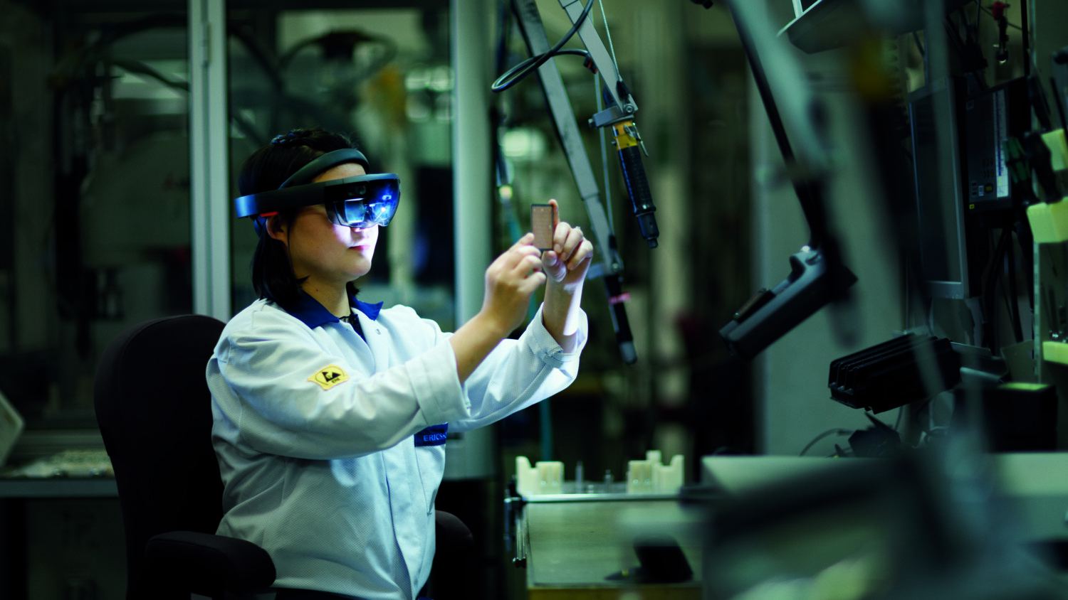 Woman in factory in VR glasses