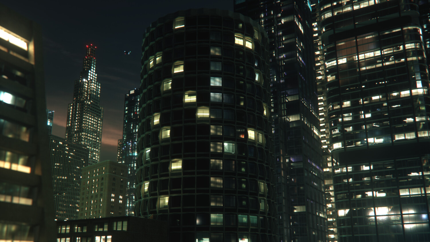 Night city skyline with brightly lit skyscrapers and buildings.