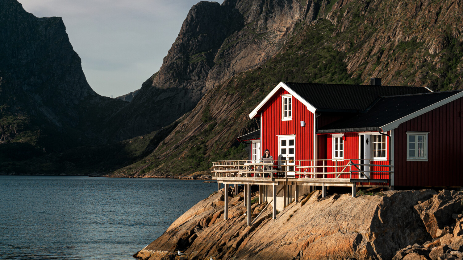 Woman working with FWA from her house on the lakeside