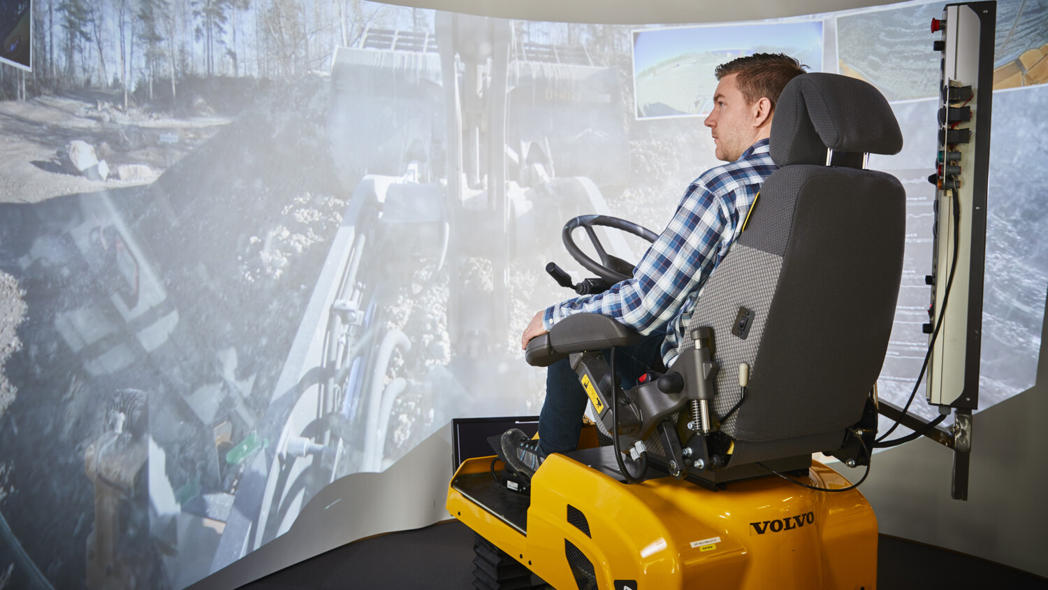 Worker in front of automation screen at Volvo's 5G enabled facility in Eskilstuna, Sweden 