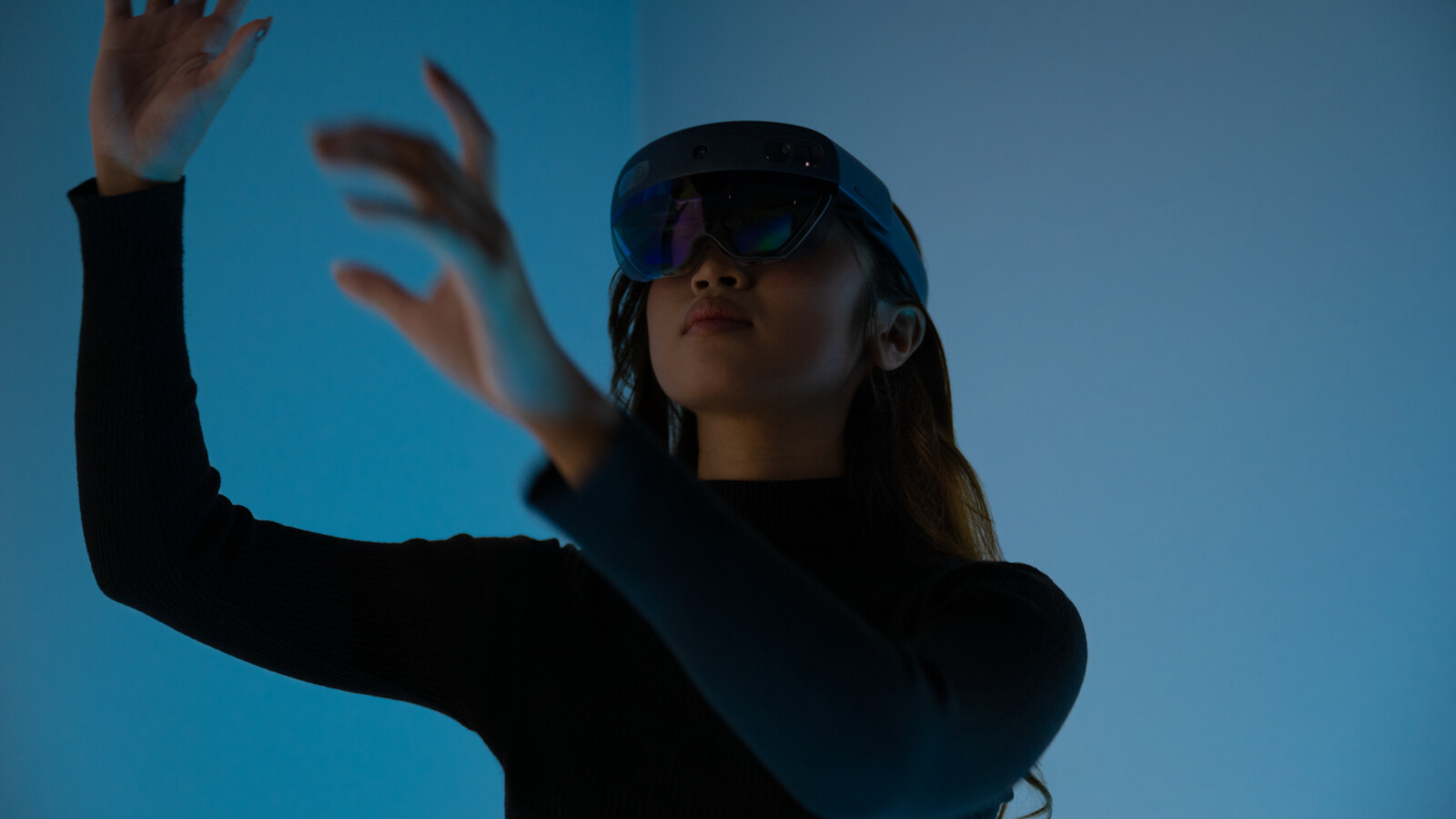 Woman using VR set in experience center