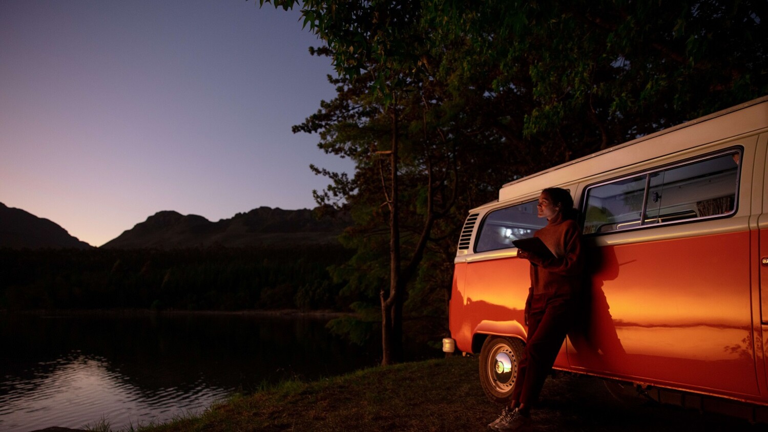 Person looking over a lake 