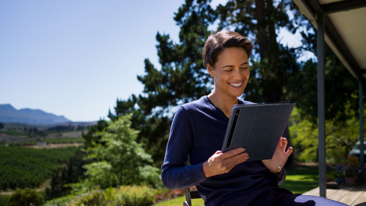 A woman using tablet with 5G FWA