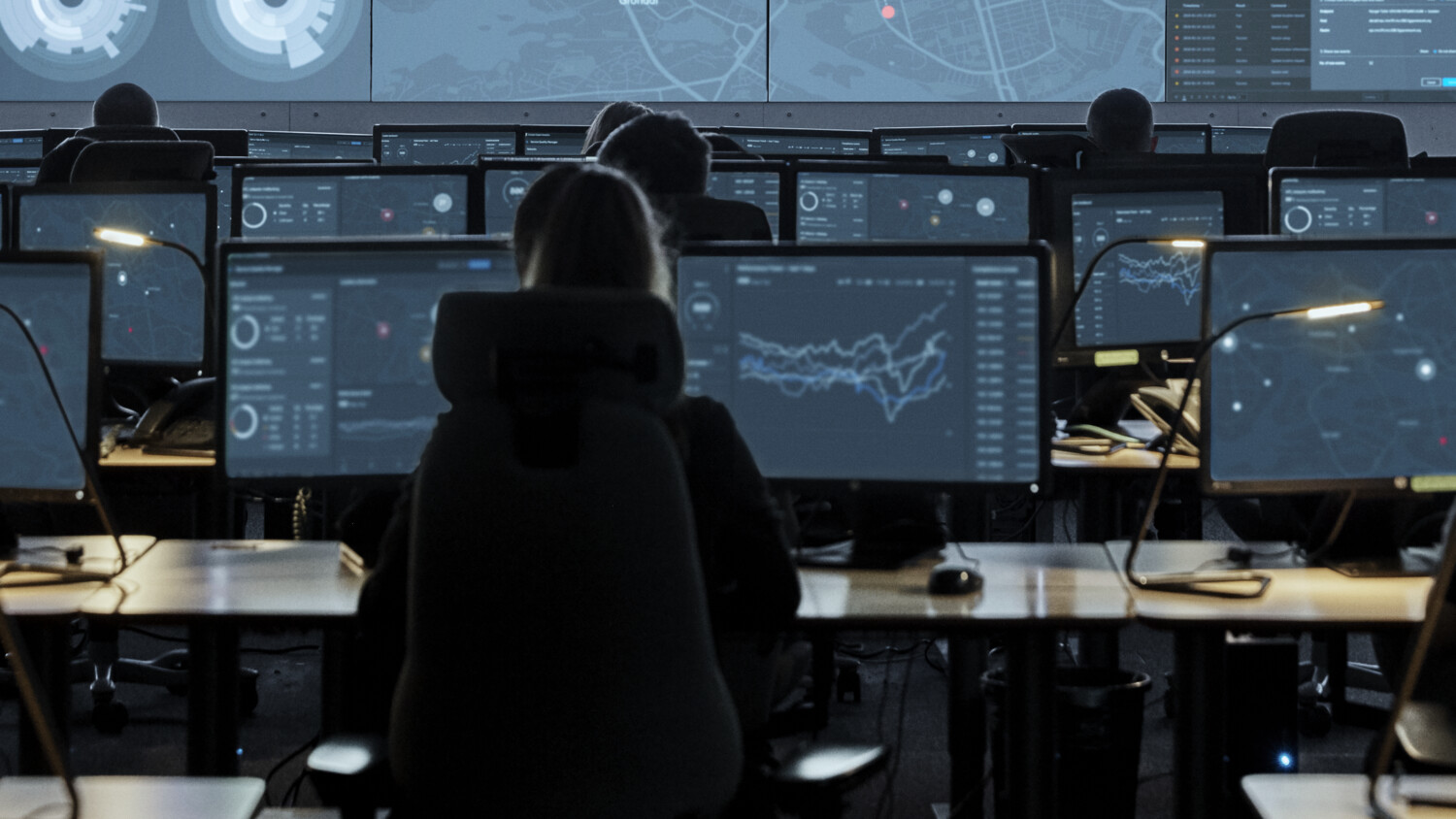 Employees in a network operations center.