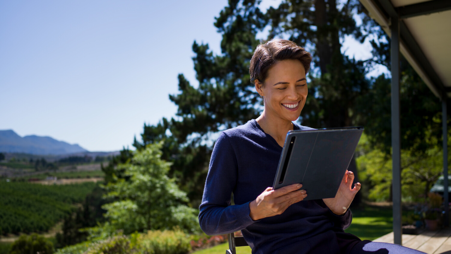 A woman using tablet with 5G FWA