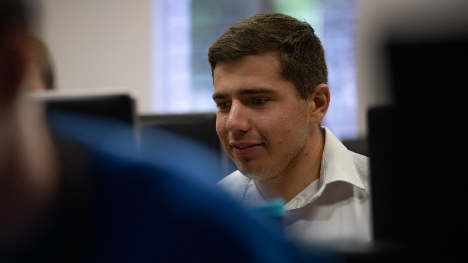 A student working on a computer.
