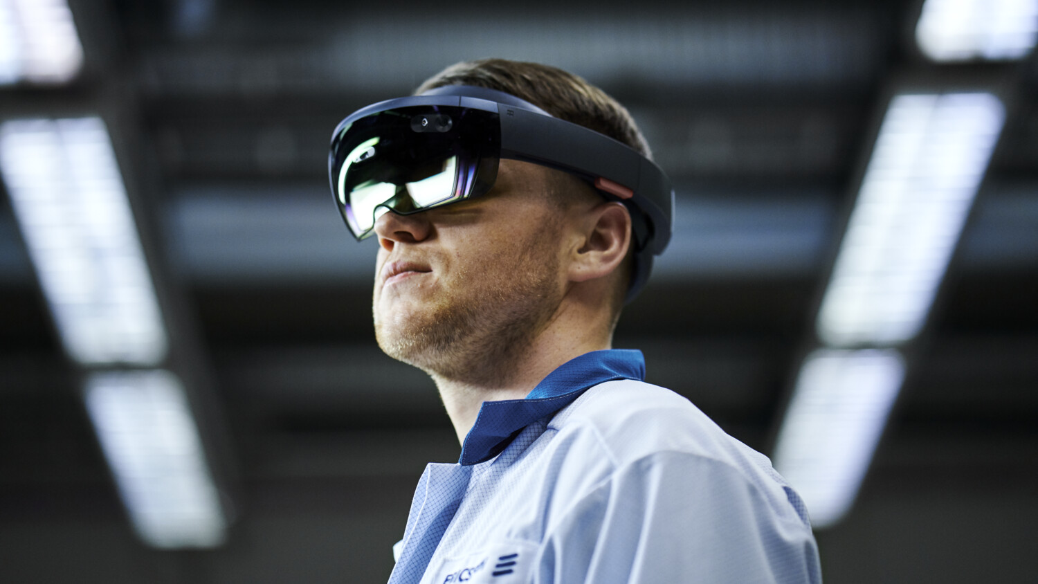 Man in factory using AR