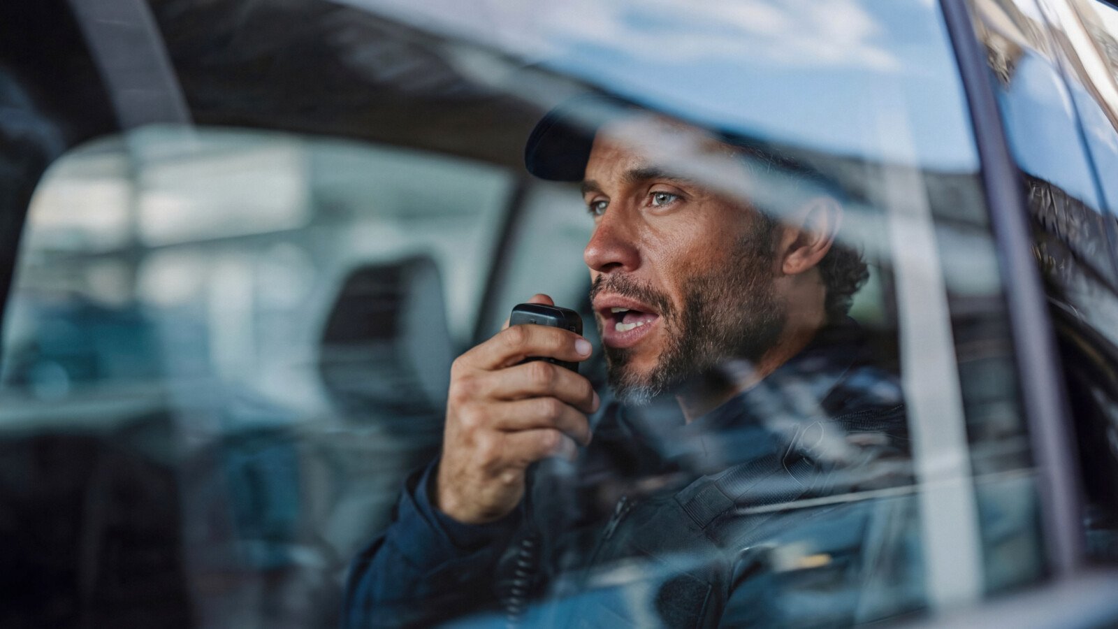 Police officer talking on radio