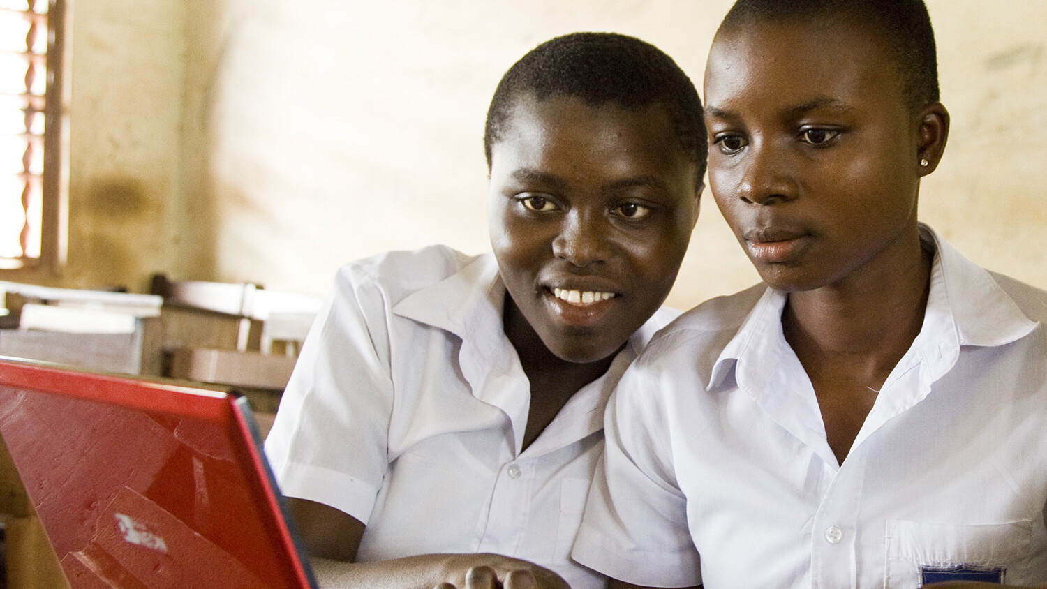 students with a laptop