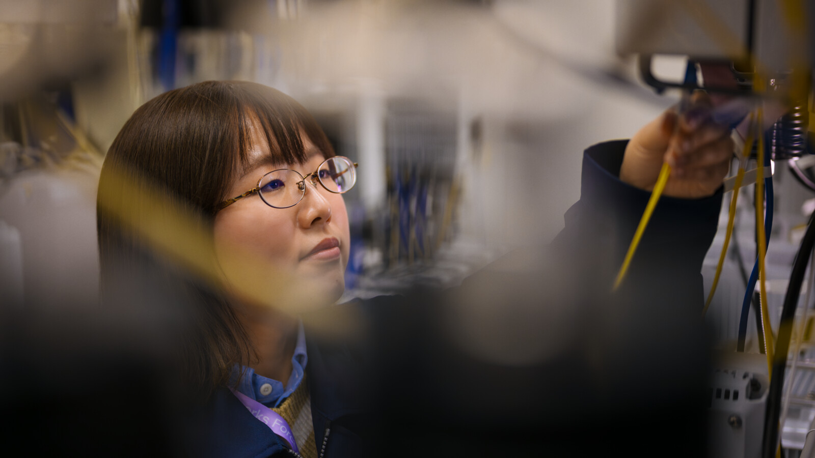 Young lady checks the cables