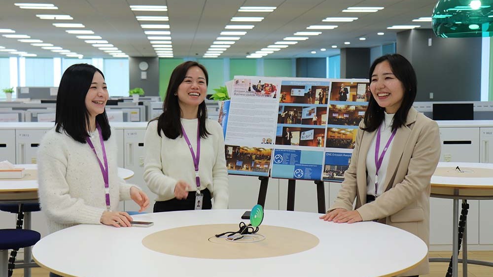 Ericsson Japan women employees talking and laughing