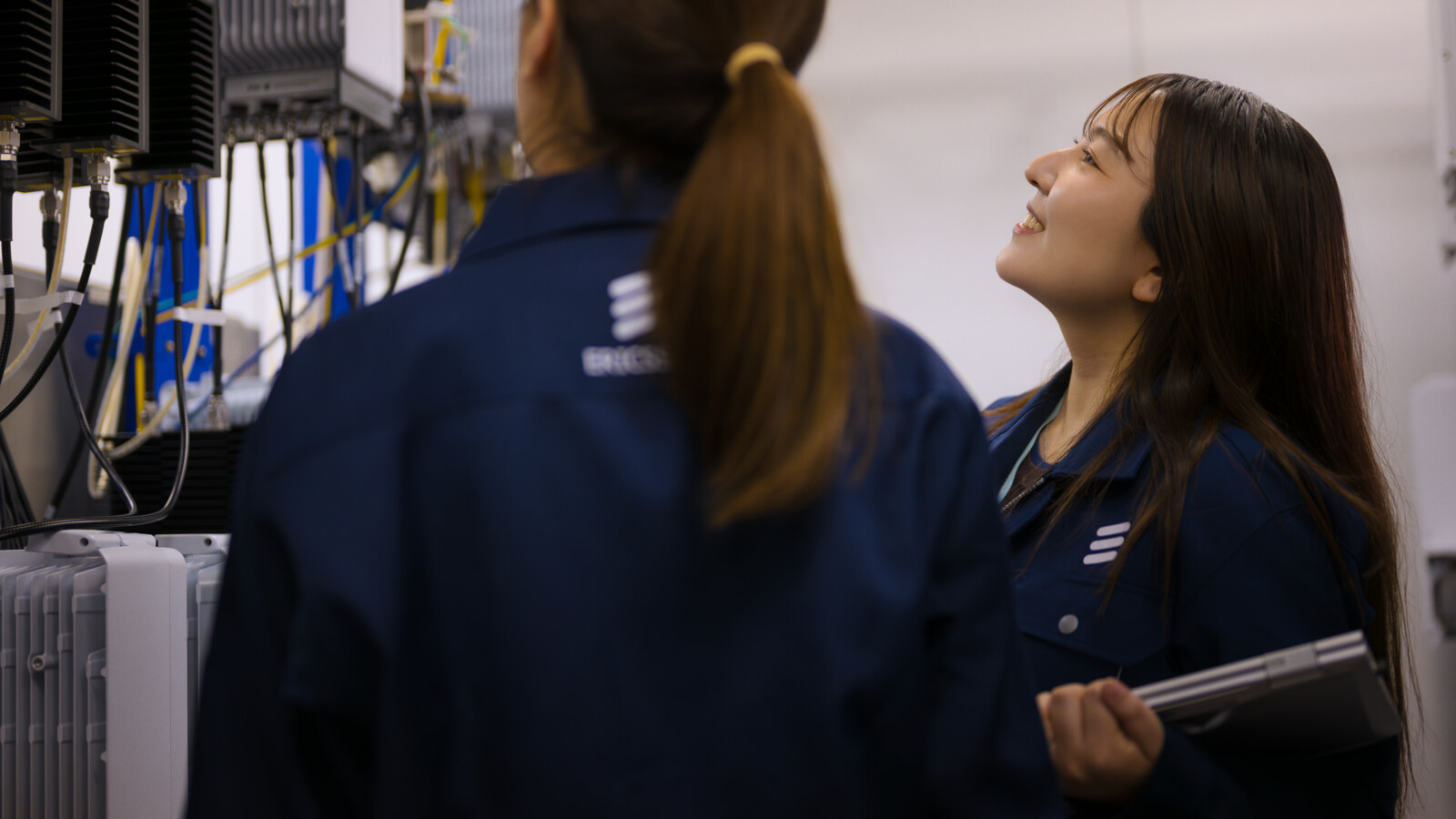 Two ladies checking the system