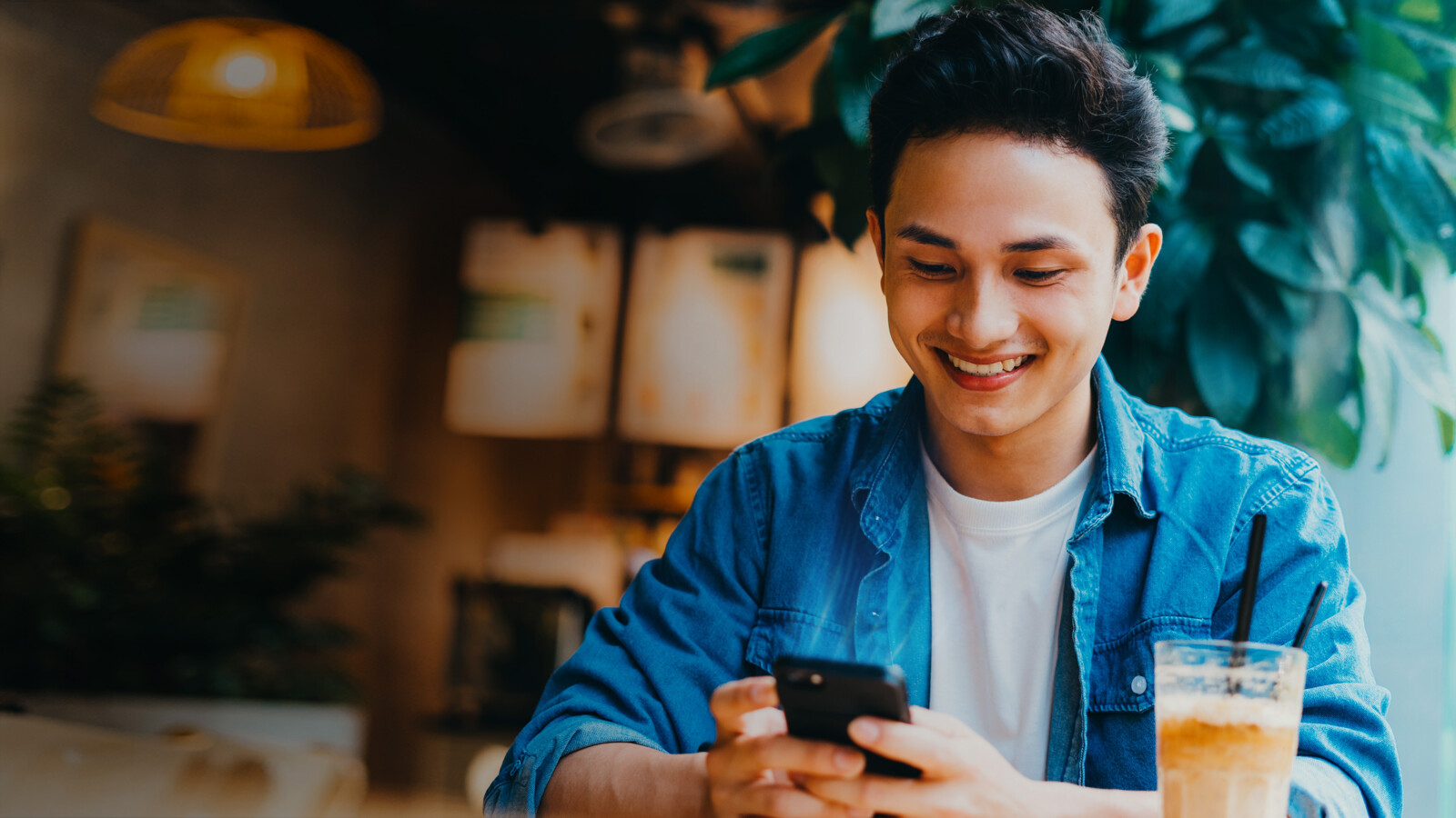 Standard Essential Patents - image of Happy smartphone user