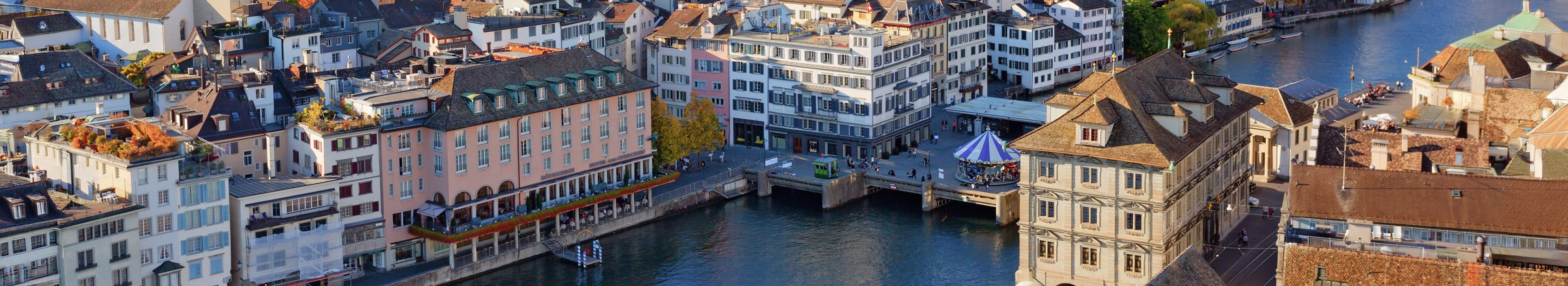 Cityscape with river and clock tower
